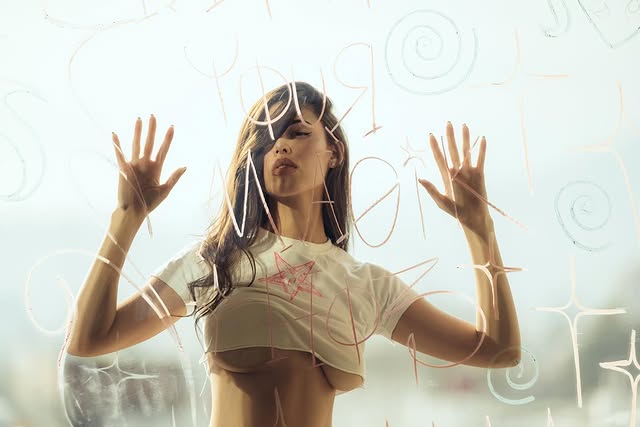 Editorial shot against a glass wall