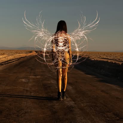 Desert scene with wings of light